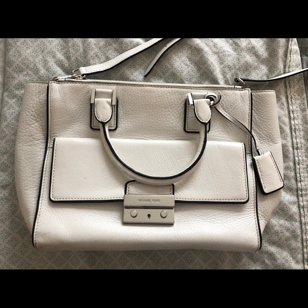White Michael Kors purse.